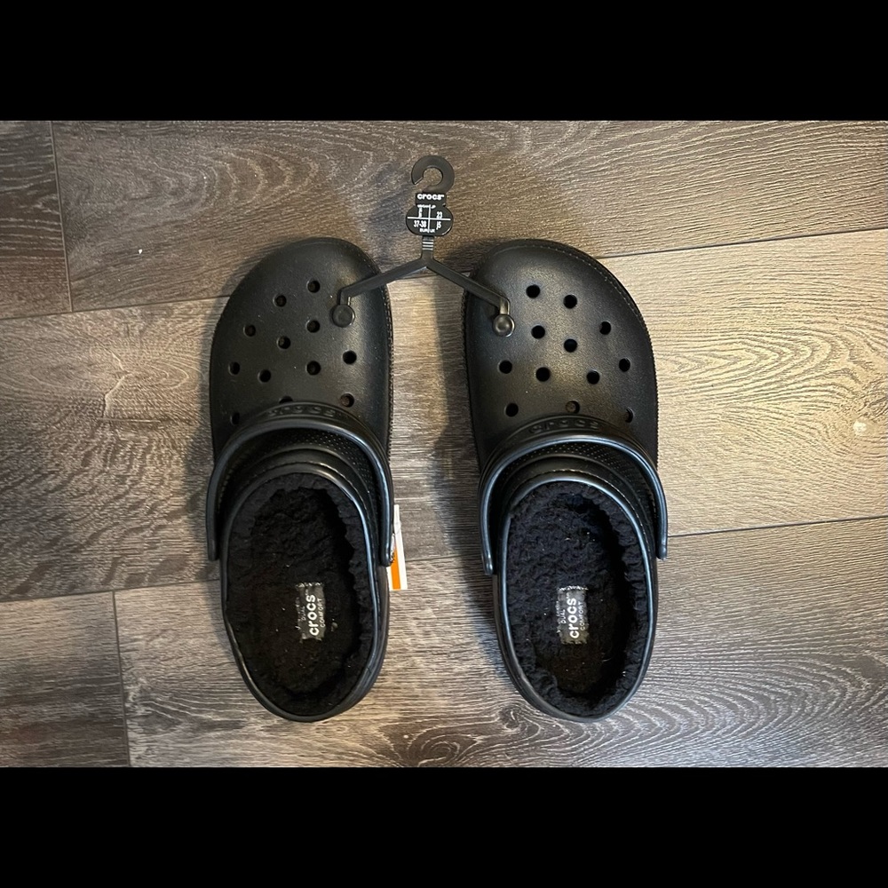 Black fuzzy crocs juniors 5 so would fit a womens 6.5 or 6.